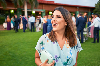 Closeup of wedding guest smiling